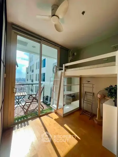 Bright studio with loft bed and balcony offering stunning city views