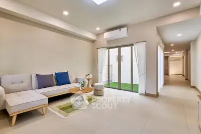 Spacious modern living room with elegant decor and natural light