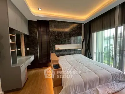 Luxurious modern bedroom with elegant lighting and large windows