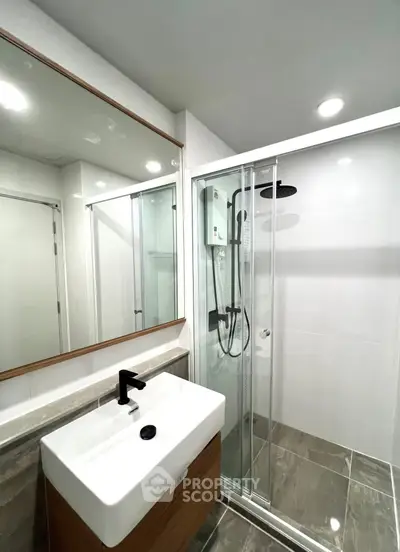 Modern bathroom with sleek shower and stylish sink