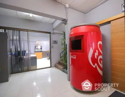 Unique office space with Coca-Cola themed decor and modern interior design