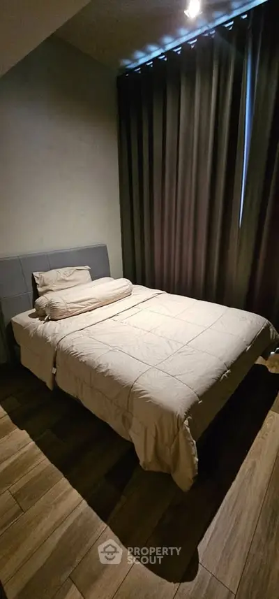 Cozy bedroom with modern decor and soft lighting