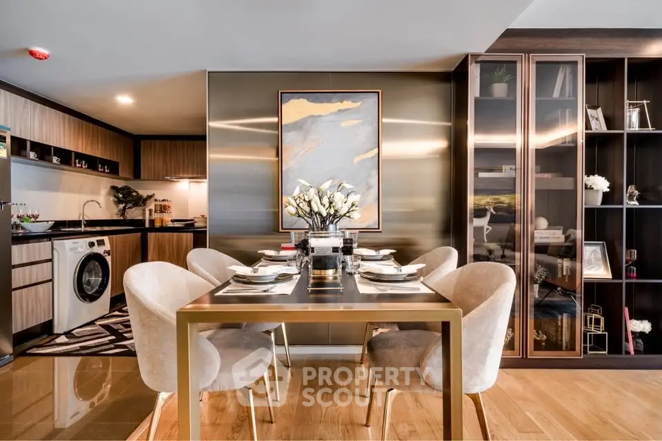Luxurious modern dining area with elegant decor and integrated kitchen appliances.