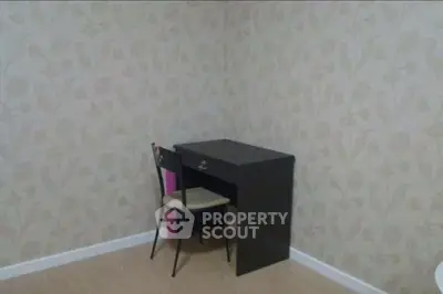 Minimalist study corner with desk and chair in a cozy room