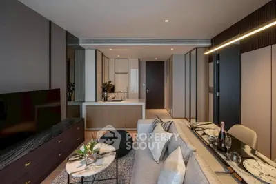 Modern living room with sleek design and open kitchen layout