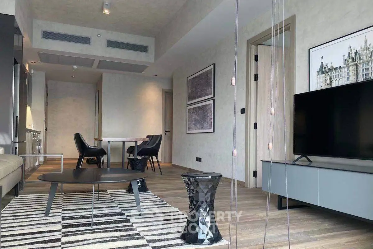 Modern living room with sleek furniture and stylish decor, perfect for urban living.