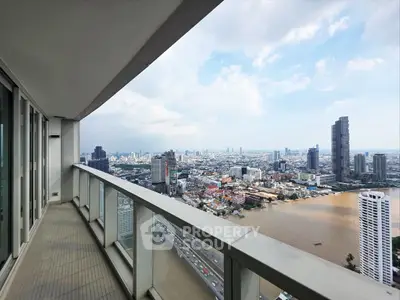Stunning high-rise balcony with panoramic city and river views