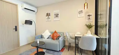 Modern living room with stylish decor and cozy seating area, perfect for relaxation and entertaining.
