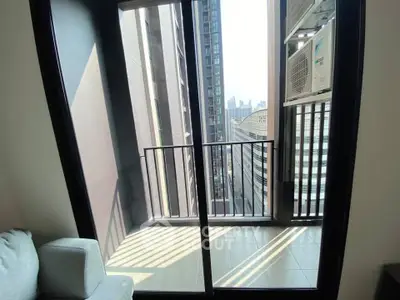 Modern apartment balcony with city view and air conditioning unit.