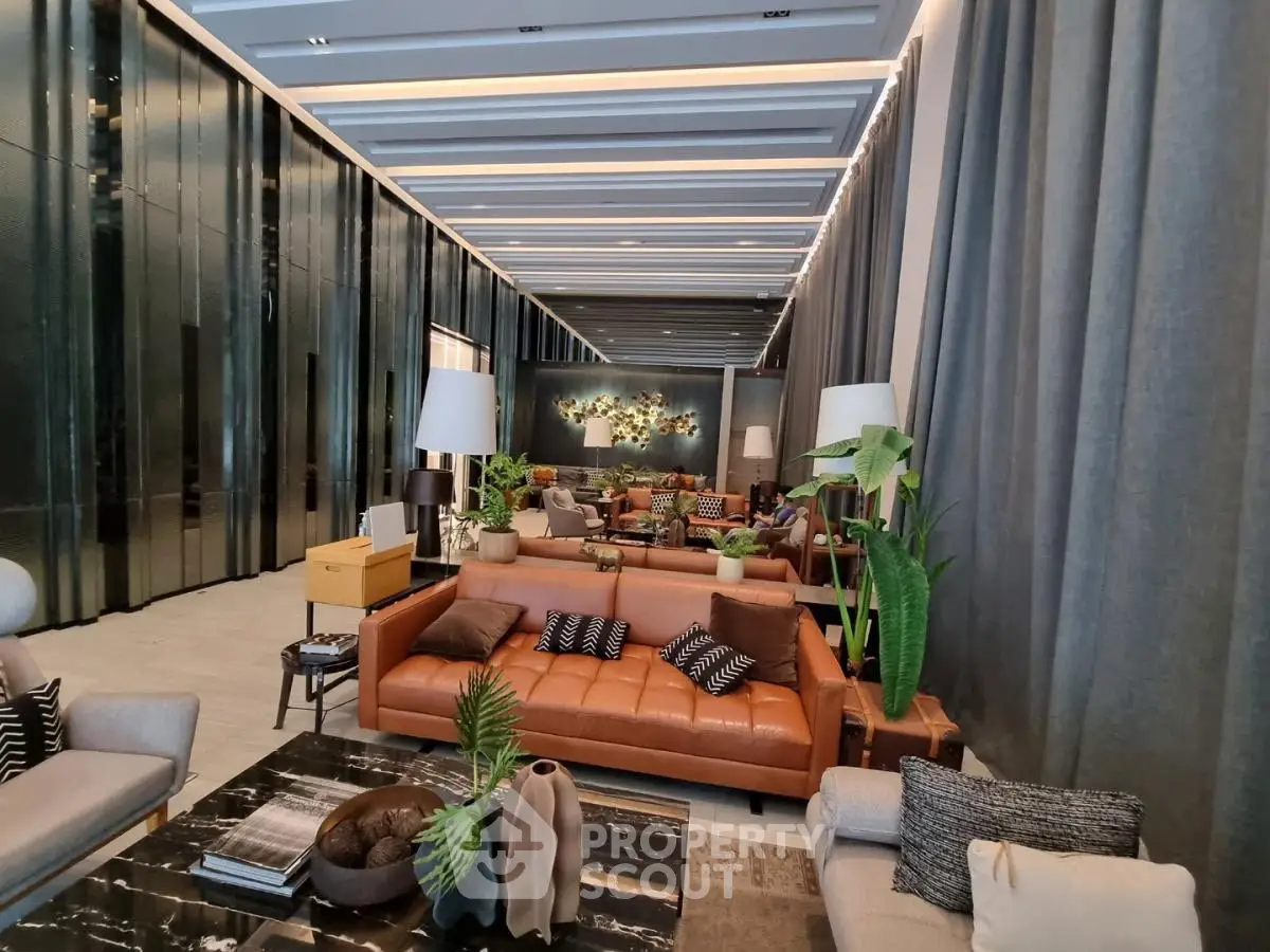 Luxurious modern living room with elegant decor and spacious seating area.