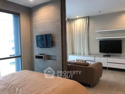 Modern apartment interior with stylish living room and bedroom separation