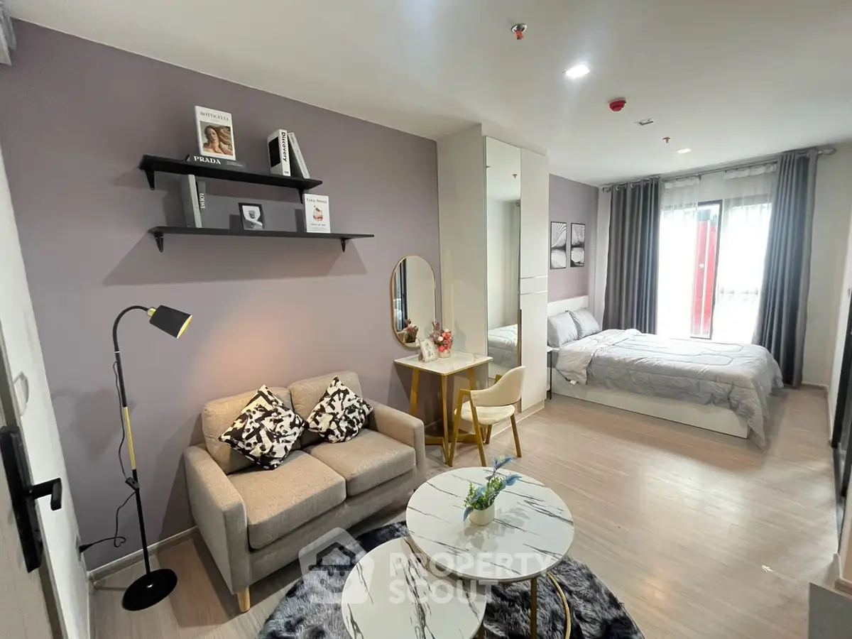 Modern studio apartment with stylish decor and cozy living area