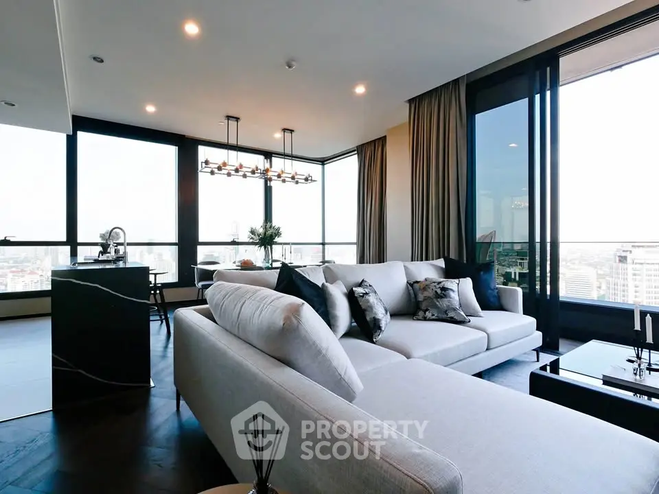 Luxurious modern living room with panoramic city views and elegant furnishings.