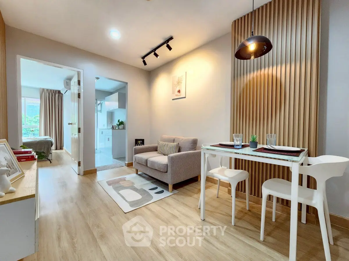 Modern living room with cozy dining area and stylish decor