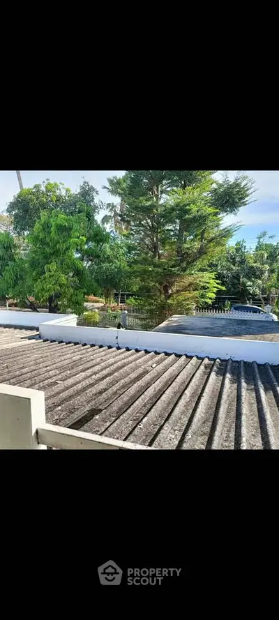 Charming outdoor view with lush greenery and serene surroundings, perfect for nature lovers.