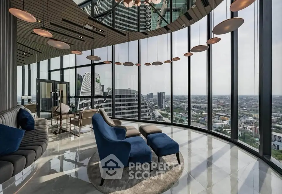 Luxurious modern living room with panoramic city views and elegant furnishings.