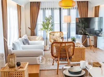 Elegant living room with modern decor and large windows