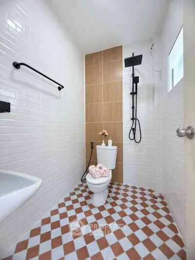 Modern bathroom with stylish tiles and sleek shower design