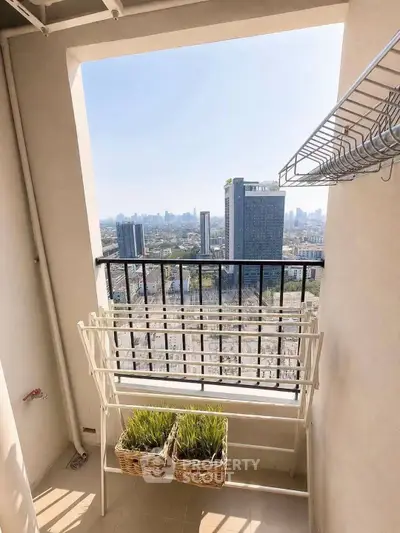 Stunning balcony view with cityscape, perfect for relaxation and enjoying urban living.