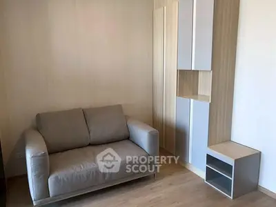 Cozy living room with modern sofa and stylish storage unit