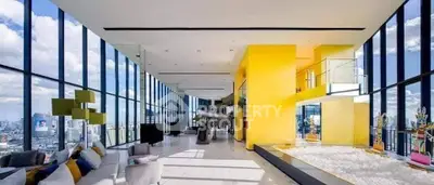 Luxurious penthouse with panoramic city views and modern interior design.