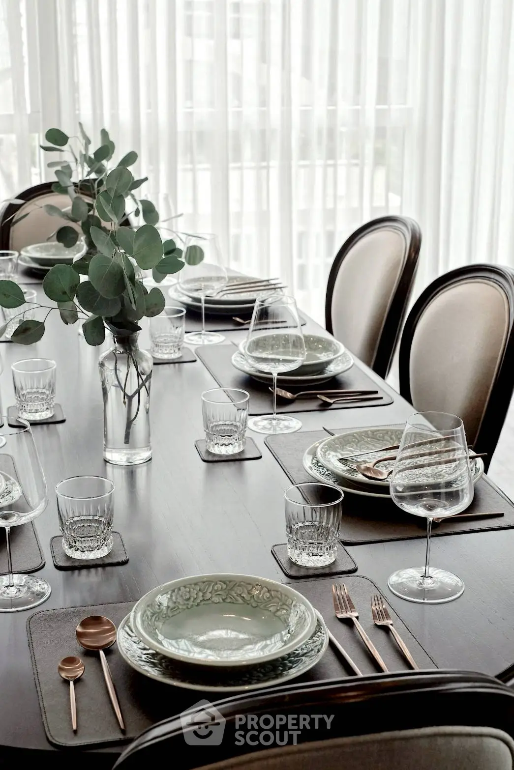 Elegant dining room with stylish table setting and natural light