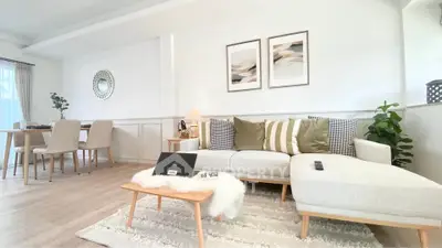 Spacious modern living room with elegant decor and natural light