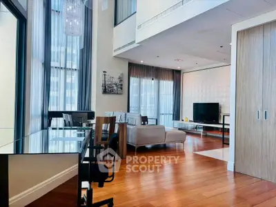 Spacious modern living room with high ceilings and elegant decor