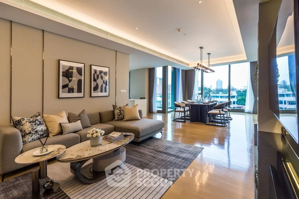 Luxurious modern living room with elegant decor and spacious dining area.