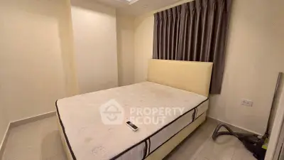 Cozy bedroom with a comfortable bed and modern decor