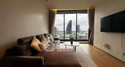 Luxurious living room with stunning city view and modern furnishings