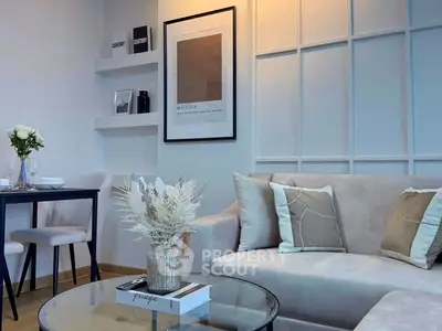 Stylish modern living room with elegant decor and cozy seating area.