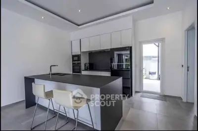Modern kitchen with sleek island and minimalist design