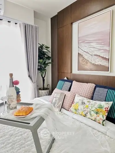 Chic bedroom with elegant decor and cozy bedding, perfect for relaxation.