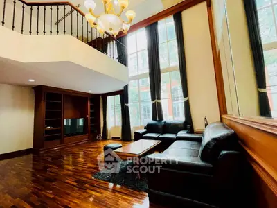 Luxurious living room with high ceilings and elegant decor