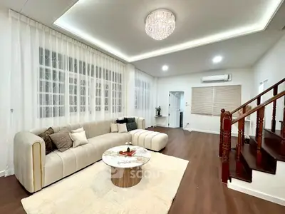 Elegant living room with luxurious chandelier and modern decor