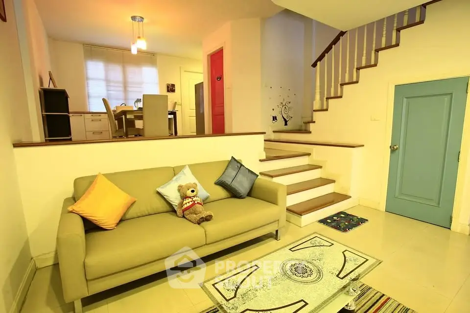 Charming split-level living room with cozy sofa and modern decor