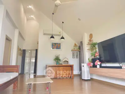 Spacious modern living room with high ceiling and stylish decor