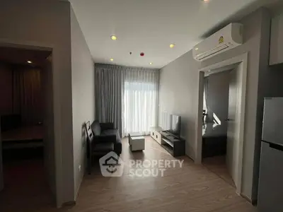 Modern living room with sleek furniture and natural light