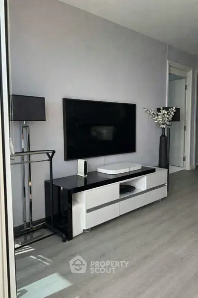 Modern living room with sleek TV stand and elegant decor