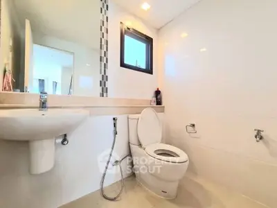 Modern bathroom with sleek fixtures and natural light