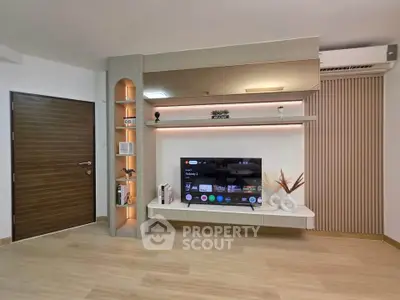 Modern living room with sleek TV unit and stylish decor