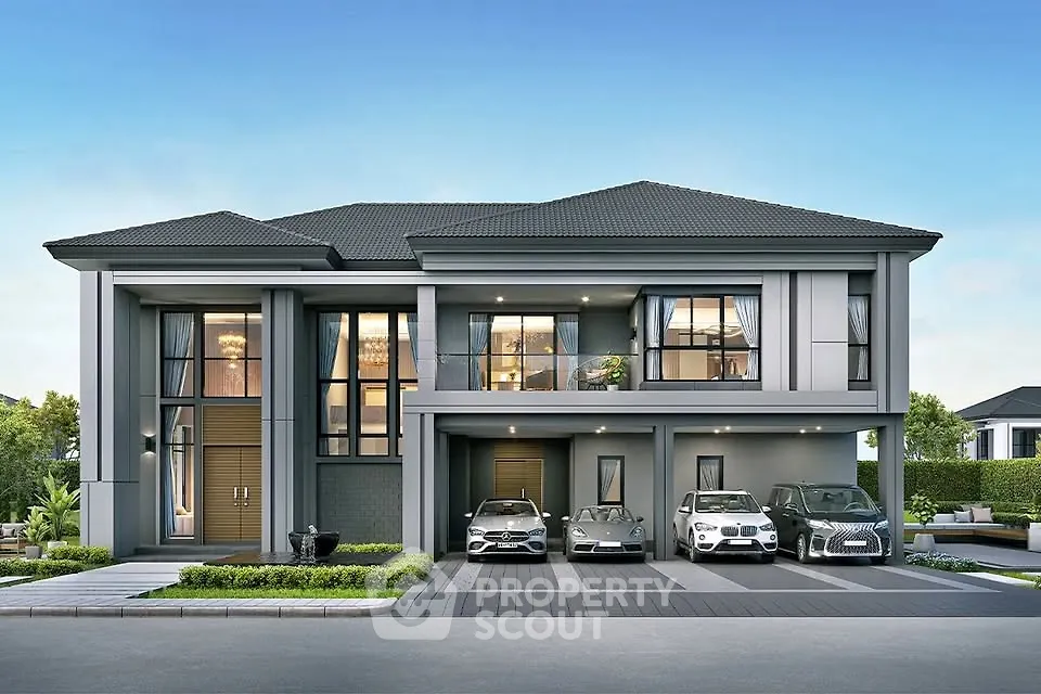 Luxurious modern house with multiple car garage and elegant facade.