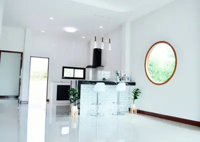 Modern kitchen with open layout and stylish island bar