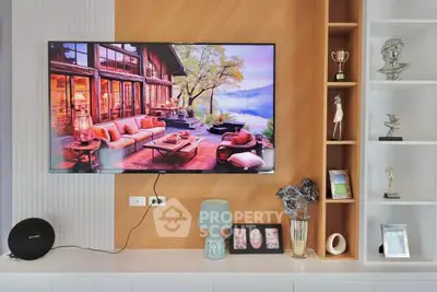 Stylish living room with modern decor and wall-mounted TV