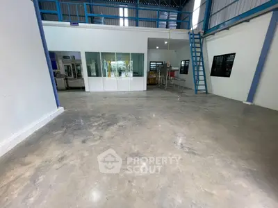 Spacious industrial warehouse with mezzanine and modern interior design