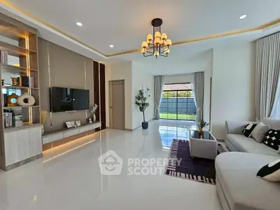 Spacious modern living room with elegant decor and large windows