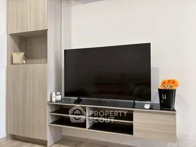 Modern living room with sleek TV unit and stylish decor