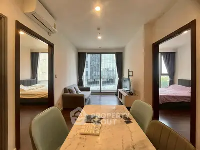 Modern apartment interior with open living area and city view