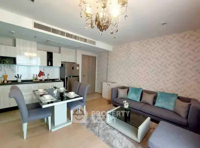 Modern living room with stylish decor and open kitchen layout